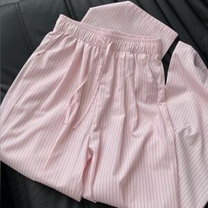 Striped Pink Straight Leg Pants. Runs small fits someone that weighs 120-135 lbs